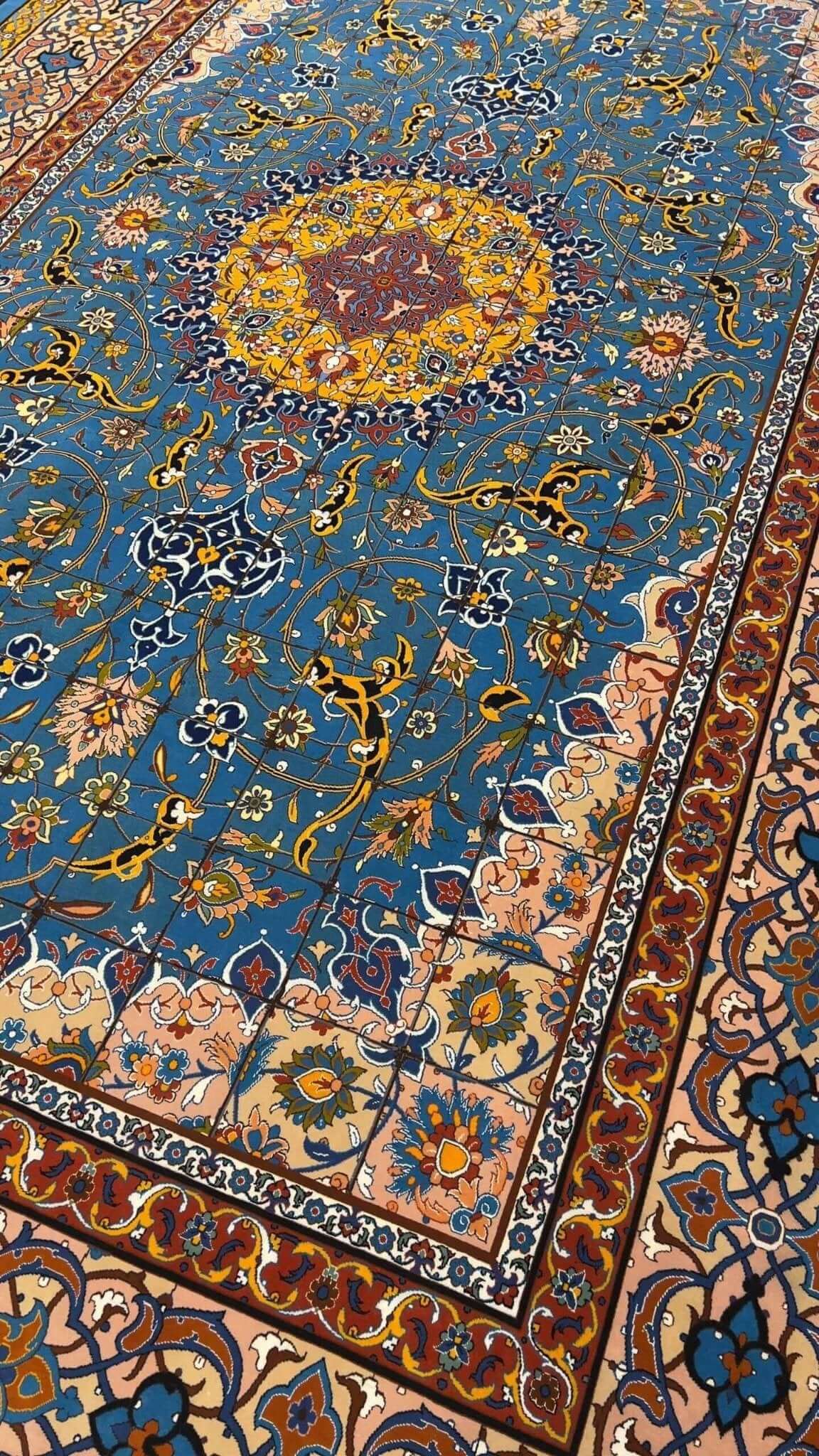 "Exquisite Persian Isfahan rug crafted from wool and silk, showcasing vibrant patterns, made by Master Haghighie."